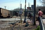 A few folks wait for the train of empties to clear Washington Street.  Lynchburg has a very good trail system due in large part to early railroad construction that commenced some 170 years ago.